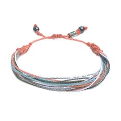 PASTEL BOHO BRACELET:This hand-knotted multi-strand pastel string bracelet includes two genuine Hematite stones and a Rumi Sumaq logo bead. In summer shades of coral orange, metallic silver, light blue, navy and white it is the perfect boho beach accessory for surfers, sailors and beach lovers alike. Or you may think of this string bracelet as a sophisticated and grown up friendship bracelet. Buy one for yourself and another for your best friend. Or make it a sister's bracelet by purchasing one Multicolor Multi-strand Friendship Bracelets For Beach, Everyday Multicolor Braided Bracelet With Waxed Cord, Multicolor Braided Bracelets With Sliding Knot For Everyday, Multicolor Braided Bracelet With Sliding Knot For Everyday, Adjustable Multi-strand Bracelets For Summer, White Nylon Cord Bracelets For Beach, Multicolor Braided Bracelet With Sliding Knot, Beach Friendship Bracelets With Waxed Cord, Casual Multi-strand Beach Jewelry