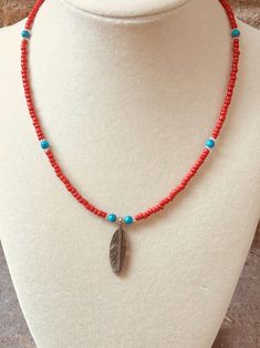 Feather choker boho vibe with red primary colors and turquoise accents. Turquoise Accents, Boho Feathers, Boho Choker, Crystal Lake, Boho Vibe, Genuine Turquoise, Turquoise Beads, Seed Beads, Choker Necklace