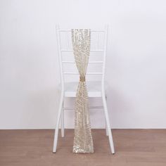 Introducing the epitome of elegance and sophistication \u2013 our Geometric Diamond Glitz Sequin Chair Sashes. Crafted to infuse a touch of glamour into any event, these sashes redefine luxury decor. Adorned with shimmering sequin beads delicately placed atop a tulle net fabric, the interplay of light and texture creates an enchanting visual spectacle that captures attention. Silver Fitted Sash For Party, Fitted Silver Sash For Party, Chair Sash, Chair Sashes, Bridal Show, Color Champagne, Wedding Ceremonies, Net Fabric, Chair Decorations