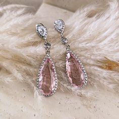 These exquisite soft pink drop earrings are the perfect accessories for your boho wedding and the special sparkling and romantic touch for your outfit! These dangling drop earrings are made of rhodium plated brass elements and splendid light pink teardrops exalted with cubic zirconia crystal rhinestones.  DETAILS: - materials: rhodium plated brass, Cubic Zirconia rhinestones, glass crystals - total length: 4.2 cm - weight: 4.2 grams - lightweight, comfortable and easy to wear - AAA high quality materials EXCLUSIVE DESIGN BY L'ACCHIAPPASOGNI JEWELRY since 2024 © L'Acchiappasogni Jewelry These earrings come packaged in a kraft paper gift box with cute, handmade details. SHIPPING All orders will be shipped out through DHL Express, FedEx or UPS Express. Please double check the address is corre Light Pink Earrings, Bridal Earrings Statement, Pink Drop Earrings, Aesthetic Earrings, Blue Drop Earrings, Romantic Aesthetic, Pink Bridal, Long Drop Earrings, Silver Jewels