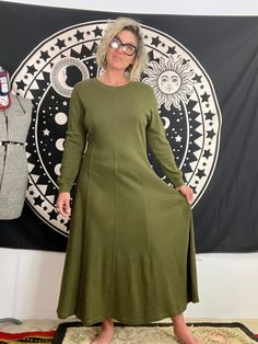 I love Fads brand. Cotton army green long sleeve dress  Flowy skirt line  No pockets  Amazing condition  Tag reads size large  Fits a medium/large  I'm a medium and this fit me with some room  Measurements are approximate and taken flat so please double bust waist and hips for more accurate sizing  Bust: 18.5 in Waist: 17 in  Hips: 22 in  Length: 50 in  All sales are final  Thanks for checking out Cereal Vintage Thrift  Recycle Reuse Recreate  Peace Love Vintage Green Long-sleeved Dress With Pockets, Oversized Green Cotton Maxi Dress, Vintage Green V-neck Maxi Dress, Vintage Long-sleeved Cotton Hooded Jacket, Vintage Green Cotton Parka, Vintage Green Long Sleeve Parka, Room Measurements, Green Long Sleeve Dress, Dress Flowy