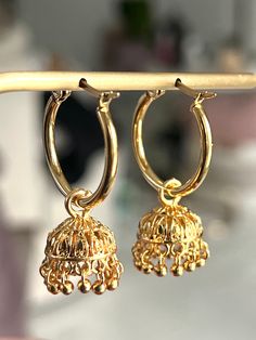 gold plated jhumki earrings on hoops, Indian style  earrings  Earrings dangle 1.25 inches long and are super light. perfect for everyday wear.  These beauties are for pierced ears, they are not clip on style. Dainty Indian Jewelry, Small Jhumki Earrings Gold, Small Jhumki Earrings, Jhumki Earrings Gold, Indian Style Earrings, Jhumki Earrings, Fancy Dress Design, Shades Of Gold, Indian Style