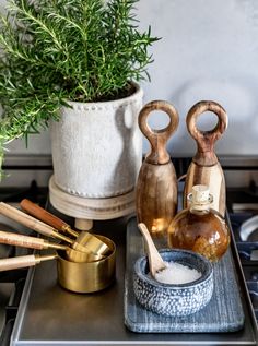 an assortment of kitchen utensils on a tray