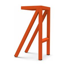 an orange stool that is sitting on the ground with one leg up and two legs down