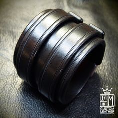 "This Black leather cuff in American Bridle leather is sophisticated, edgy and lovingly crafted. It is 2.5\" wide and every plane is scribed around the perimeter as are the keepers. The edges are beveled, slicked smooth and sealed. I'll need your wrist size for this cuff! Instructions in the pics above! - 2.5\" wide - American bridle leather - Fine craftsmanship Thanks! Freddie LIVE●LOVE♥LEATHER" Leather Cuff Wristband With Bracelet Strap, Leather Double Band Bracelet With Leather Strap, Modern Leather Cuff Bracelet, Adjustable Leather Cuff Bracelet With Bracelet Strap, Luxury Adjustable Leather Bracelet With Wrist Strap, Leather Cuff Bracelets With Black Band, Modern Leather Cuff Bracelet For Formal Occasions, Classic Adjustable Leather Wristband, Adjustable Classic Leather Wristband