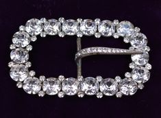 a brooch with lots of diamonds on it