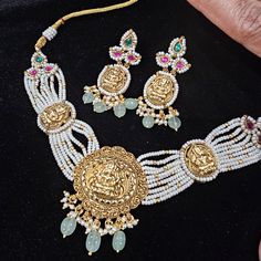 Handmade Indian Jewelry item   * Stunning Hand made Traditional jewelry set.   * Necklace Set is a combo of Necklace & Stud Earrings   * Necklace is adjustable with adjustable back chain/ Dori/ Cord   * Packed in a box, Ideal For GiftingOn Request, We Can Add A Custom Message For Your Loved One (At No Additional Cost) :)   * Gold Color is matte gold tone,   Color, shades, texture displayed may slightly vary from the actual product due to digital image limitations. We request you to consider these minor variations. Please expect the possibility of some slight imperfections when buying handmade jewelry. If you have any questions, please contact us.   CARE: Keep jewelry away from direct heat, water, perfumes, deodorants and other strong chemicals as they may react with the metal or plating. T Festive Navratri Jewelry With Matching Earrings, Celebration Jewelry With Matching Earrings For Navratri, Navratri Celebration Jewelry With Matching Earrings, Diwali Temple Jewelry With Matching Earrings, Festive Matching Earrings For Navratri, Traditional Bridal Necklace With Matching Earrings For Festivals, Adjustable Temple Jewelry Sets For Festive Occasions, Festive Adjustable Temple Jewelry Sets, Festive Temple Jewelry Sets