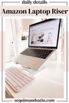 an open laptop computer sitting on top of a desk next to a keyboard and mouse