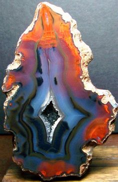 a piece of art that looks like it is made out of agate and silver