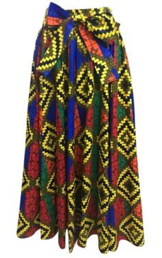 This full-bodied African Print Ankara Maxi Skirt is sure to turn heads. It's vibrant colors and design make this skirt a wonderful addition to any wardrobe. Handcrafted by experienced garment workers, our Ankara skirt is made of 100% African wax cotton. Material: African wax cotton Size: One size fits most Traditional Multicolor Long Wrap Skirt, Multicolor Fitted Long Wrap Skirt, Multicolor Lined Wrap Skirt, Traditional Fitted Multicolor Skirt, Multicolor Long Lined Wrap Skirt, Traditional Multicolor Flared Skirt, Multicolor Relaxed Flared Wrap Skirt, Fitted Multicolor Cotton Maxi Skirt, Fitted Multicolor Lined Wrap Skirt