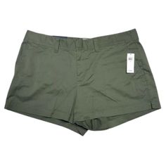 Gap Olive Green Khaki Mid-Rise Stretch City Shorts. Dual Hook And Bar With Zipper Closure And A 4-Pocket Design. Perfect For Your Spring And Summer Outfits Whether It's Casual With Flats And A T-Shirt Or Dressed Up With Heels And A Blouse. Some Stretch For A More Comfortable Fit. Size: 14 Condition: Nwt Materials: 97% Cotton, 3% Spandex Measurements: Approx. 3" Inseam X 11.25" Rise X 17.5" Waist (Flat Lay Measurement) Always Authentic! Smoke-Free Home. Offers Are Welcome & Encouraged! Posh Newbi Gap Cotton Shorts With Pockets, Gap Green Relaxed Fit Bottoms, Gap Green Short Bottoms, Green Relaxed Fit Gap Bottoms, Green Gap Shorts For Summer, Green Short Bottoms By Gap, Green Gap Shorts, Gap Shorts With Pockets For Spring, Gap Bottoms With Pockets, Short