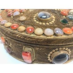 Large vintage Moroccan wedding jewelry box inlaid with semi-precious agate stones and covered with brass and silvered metal filigree. Large circular Moorish Middle East jewelry dressing box, very impressive. Some missing stones. Antique Beads, Gems, And Cabochons As Gifts, Antique Handmade Beads For Gifts, Antique Handmade Beads As Gift, Antique Handmade Beads Gems And Cabochons For Gift, Traditional Gemstone Beads And Cabochons For Gifts, Middle East Jewelry, Moroccan Wedding, Vintage Moroccan, Agate Stone