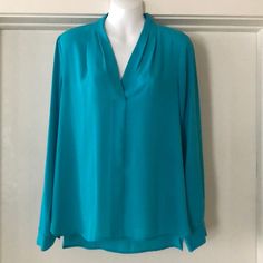 Beautiful Blouse In Excellent Condition! Looks Brand New! It’s A Beautiful Turquoise Blue Chic Turquoise Blouse For Spring, Elegant Fitted Turquoise Tops, Long Sleeve Turquoise Blouse For Spring, Casual Long Sleeve Turquoise Blouse, Casual Turquoise Long Sleeve Blouse, Beautiful Blouses, Turquoise Blue, Vince Camuto, Color Blue