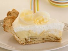 a piece of pie sitting on top of a white plate