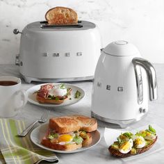 an advertisement for williams sonoma featuring toasters and plates with breakfast foods on them