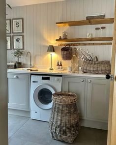 a laundry room with a washer and dryer in it