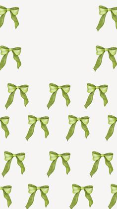 many green bows tied together on a white background