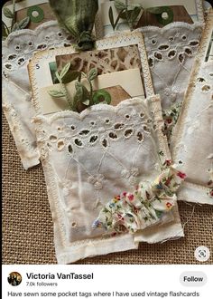 two pieces of cloth with flowers and leaves on them are sitting next to each other