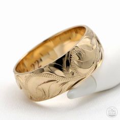 Sea turtle ring from Hawaii. Green Sea Turtle in Hawaiian tradition is a symbol of good luck in the form of a guardian spirit, or Amakua in Hawaiian. Handmade with solid 14K gold. Ring width is 8mm. Lovin' Hawaii Jewelry Features Made to Order. Handmade in Hawaii. Hand engraved design. Gold Karat: 14 Karat Available Gold Color: Rose Gold / Yellow Gold / White Gold Ready to Ship in 5 Business Days from HAWAII. Free inside message engraving. To make the piece more personal, you can add a special m Yellow Gold Symbolic Carved Jewelry, Carved Symbolic Yellow Gold Jewelry, Symbolic Carved Jewelry For Formal Occasions, Engraved Wide Band Heirloom Jewelry, Heirloom Wide Band Engraved Jewelry, Traditional 14k Yellow Gold Engraved Ring, Heirloom Wide Band 14k Gold Jewelry, Traditional Yellow Gold Rings Stamped 14k, Traditional Yellow Gold Engraved Ring