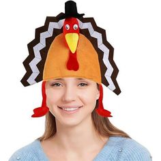 a woman wearing a turkey hat on top of her head