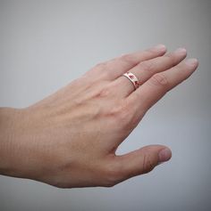 Silver ring Swallows with hot enamel of red color - one of the first rings in history of Dari jewelry brand and one of the most popular as well. Be free like a bird!https://www.etsy.com/listing/553811340/ - Ring Swallows without enamelhttps://www.etsy.com/listing/567157714/ - Ring Blue Swallowshttps://www.etsy.com/listing/580566473/ - Ring Black SwallowsThis ring perfectly combines with : https://www.etsy.com/listing/539814068/ - Earrings Swallowshttps://www.etsy.com/listing/554958693/ - Pendant White Gold Enamel Rings With Polished Finish, White Enamel Open Ring For Anniversary, Red Metal Ring Jewelry For Anniversary, White Enamel Rings With Polished Finish, White Gold Enamel Ring Fine Jewelry, White Gold Enamel Ring In Fine Jewelry Style, White Enamel Anniversary Rings, Silver Enamel Promise Ring, Silver Open Enamel Ring For Promise