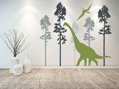 an image of a dinosaur and birds in the forest wall decal sticker set