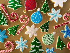 christmas cookies decorated with icing and candy canes