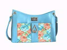 Beautiful spring/ summer colors on this handbag. Made of faux leather and accent in cotton fabric. Gold color on hardware Pattern by Shamballa size  High: (20, 5 cm) 8" Wide: (30 cm) 12" Deep: (9 cm) 3-1/2" Spring Blue Shoulder Bag With Leather Handles, Blue Shoulder Bag With Leather Handles For Spring, Summer Breeze, Summer Colors, Purses And Handbags, Shoulder Bags, Gold Color, Cotton Fabric, Faux Leather