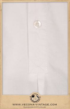 "Complete your Vecona Vintage outfit with our classic 1930s Oxford shirt. Spearpoint collar, half-placket, and gussets at the side seams are the most remarkable details of this 100% cotton shirt. It opens with a row of real mother-of-pearl buttons. The fine oxford shirting has a sophisticated texture that goes perfectly with tweed, gabardine and linen. Color white Material 100% cotton Size S: collar 37cm / 14.5\" Size M: collar 39cm / 15.5\" Size L: collar 41cm / 16\" Size XL: collar 43cm / 17\" Classic White Polo Collar Shirt, Classic White Shirt With Buttons, White Cotton Shirt With Concealed Placket, Classic Daywear Shirt, Classic Shirt With Placket For Daywear, White Cotton Dress Shirt With Fold-down Collar, Classic Shirt With Johnny Collar And Button Closure, Cotton Johnny Collar Shirt, Cotton Johnny Collar Shirt For Daywear