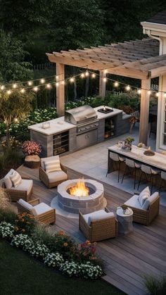 an outdoor fire pit surrounded by patio furniture and string lights on the roof above it