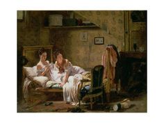 two women sitting on a bed in a room next to a chair and other furniture