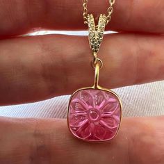 A beautiful pink Tourmaline quartz carved square flower pendant with gold satellite chain necklace.Handmade from pink Tourmaline quartz cushion cut carved flower medallion with gold vermeil that hangs from a gold Cz bail and gold plated satellite chain necklace. The detail in the carving is absolutely beautiful and will make a perfect birth month flower gift or plant lover gift. It has a 14K gold filled spring ring clasp and comes in 14-18 inches long. Wear it by itself as an everyday necklace o Luxury Pink Rectangular Jewelry, Pink Square Jewelry Gift, Pink Square Jewelry For Gifts, Handmade Square Pink Jewelry, Unique Gemstone Flower Pendant Necklace, Handmade Pink Square Jewelry, Luxury Pink Flower Pendant Jewelry, Spiritual Flower Pendant Necklace With Gemstone, Delicate Rose-colored Flower Pendant Jewelry