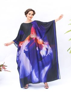 A full length kaftan plus size featured with blooming iris on the night black tone,  will bring the elegant vibe of Spring/Summer and perfect for holiday occasions or any occasion you attend. The fabric is blended silk with more than75% silk so the care is more easier with washing and iron, in addition less wrinkles. It's totally smoothly flowy, soft and gentle touch. FEATURES - Black, Purple, Light Pink, Red - Iris Blooming Floral Print - Personal Custom Made - Full Length Kaftan Half-Sleeves - Free Size Black Kaftan For Beachwear, Black Free Size Kaftan For Beachwear, Black Spring Kaftan For Evening Wear, Elegant Black Kaftan For Beach, Black Long Maxi Dress For Beach, Multicolor Evening Kaftan For Summer, Black Spring Evening Kaftan, Long Black Kaftan For Spring, Black Free Size Dress With Kimono Sleeves