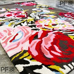 an area rug with flowers on it