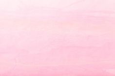 an image of a pink background that looks like it has been painted with pastel