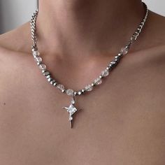 Introducing our American Ball Bead Clavicle Star Necklace. Crafted with intricate detail, this luxurious piece exudes elegance and sophistication. The unique design features a cascading chain of polished beads, leading to a dainty star pendant. Elevate your style and make a statement with this exclusive necklace. Features: - Material: Titanium steel - Circumference: 50cm-60cm - Style: ?Original design - Color: Silver - Whether to wear a pendant: Yes - Applicable gender: Unisex Silver Cross-shaped Jewelry With Beaded Chain, Silver Cross Jewelry With Beaded Chain, Silver Cross Necklace With Beaded Chain, Silver Metal Chain Necklace With Star Charm, Silver Star Necklace With Chain, Elegant Cross Necklace With Beaded Chain, Silver Beaded Cross Pendant Necklace, Silver Pendant Beaded Necklace With Pearl Chain, Silver Cross Jewelry With Pearl Chain