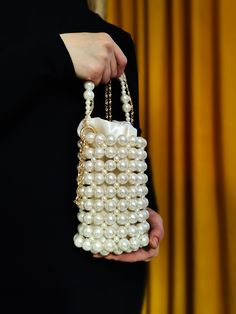 Meet our Cylinder Pearl Bag that combines elegance and sophistication! Perfect for special events, evening functions, or any special occasion. This handcrafted bag, adorned with pearl details, will elevate your look to impressive and stylish heights. Order now to create unforgettable moments with your loved ones! ✨👜 #PearlBag #EveningBag #Handcrafted #Clutch #ElegantFashion Cream Evening Bag With Pearl Handle, Elegant Cream Bag With Pearl Handle, Cream Evening Bag With Pearl Handle For Gift, Cream Evening Bag With Pearl Handle As Gift, Handmade White Evening Shoulder Bag, Evening Beige Shoulder Bag With Pearl Handle, Formal Cream Shoulder Bag With Pearl Handle, Elegant Cream Shoulder Bag For Gift, Cream Evening Shoulder Bag For Parties