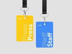 two tags that say press start, press start and google logo are hanging from black lanyards