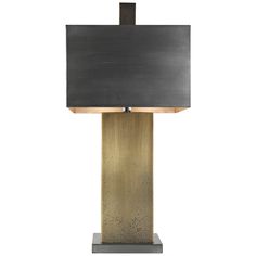 a lamp that is on top of a stand with a square light shade over it