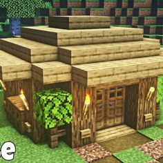 an image of a house made out of wood in the middle of a minecraft village