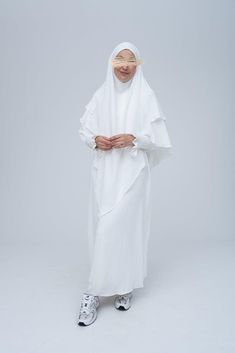 Pristine cream prayer gown for Omrah or prayer - ANNAH HARIRI White Abaya With Modesty Panel For Eid, Modest White Khimar For Eid, Elegant White Wedding Khimar, Traditional White Long Sleeve Khimar, Elegant Long White Khimar, White Long Sleeve Modest Khimar, Modest Long White Thobe, White Niqab For Eid, White Khimar For Wedding