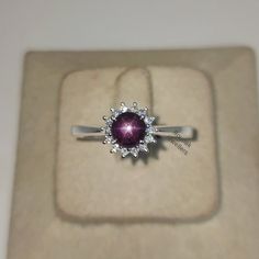 BAND - ROUNAK JEWELLERS MATERIAL - 925 STERLING SILVER GEMSTONE - 100% NATURAL STAR RUBY STAR RUBY STONE WEIGHT - 1.60 CARAT STAR RUBY STONE SIZE - 5.90 MM SECONDARY STONE - CUBIC ZIRCONIA ZIRCONIA STONE WEIGHT - 0.25 CARAT ZIRCONIA STONE SIZE - 1.30 MM   GROSS WEIGHT - 3.380 GM STONE SHAPE - ROUND GEM COLOUR - RED, WHITE RING SIZE - ALL SIZE AVAILABLE PLEASE GIVE YOUR OPENION OR FEEDBACK ABOUT THE PRODUCT. WE ACCEPT BULK ORDER ALSO. https://www.etsy.com/in-en/shop/RounakJewellers?ref=search_sho Ruby Ring Engagement, Star Ruby Ring, Round Star, Indian Star, Ruby Engagement Ring, Star Ruby, Ruby Stone, Ring Minimalist, Minimalist Ring