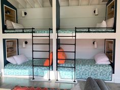 two bunk beds with ladders and pillows in a room that has been converted into a loft bed