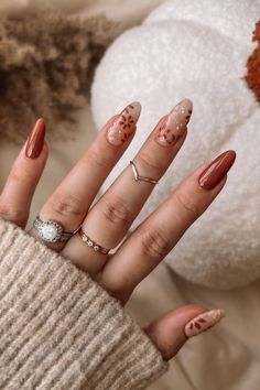 Fall nails, fall nail inspo, brown nails, fall floral nail art, almond shaped nails, neutral fall nails, November nails Autumnal Floral Nails, Cute Simple Fall Nails Short Almond, Almond Neutral Nails Designs, Fall Inspo Nails Almond Shape, November Birthday Nails Acrylic, Fall Thanksgiving Nails Almond, Floral Autumn Nails, Brown Nail Designs Fall Autumn, Autumn Nail Art Ideas