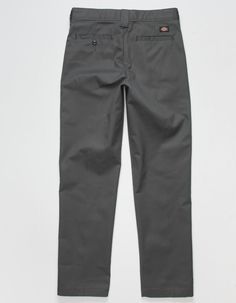 Dickies Flex Slim Taper Pants. This moisure-wicking, flat-front pant sits below the waist and has a slim fit through the seat and thigh with a tapered leg. The pant is made with a wrinkle-resistant poly/cotton twill fabric blend, which has a stain-release finish to prevent stains from setting in. Mechanical stretch flex fabric offers comfort and ease of movement with a better range of motion. Sits slightly below waist. Approx. outseam: 38.5". 65% polyester/35% cotton. Machine wash. Imported. Taper Pants, Husband Clothes, Khakis Outfit, Plain Pants, Dickies Pants, Flat Front Pants, Streetwear Men Outfits, Tapered Pants, Grey Pants