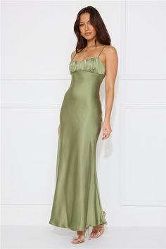 Length from bust to hem of size S: 120cm. Chest: 39cm, Waist: 32cm, across front only of size S. Maxi dress. Semi-lined. Model is a standard XS and is wearing size XS. True to size. Non-stretch. Satin. Twist detail to the back. Gathered top. Zipper with hook eye closure. Cold hand wash only. Polyester. Effortlessly chic in the Silk Shimmers Satin Maxi Dress. Featuring a captivating twist detail to the back and a delicately gathered top. Embrace timeless elegance with every step in this radiant d Khaki Dress Outfit Wedding, Green Classy Dress, Khaki Dress Outfit, Green Satin Maxi Dress, Light Green Dress, Gathered Top, Sage Dress, Olive Dress, Shimmer Dress