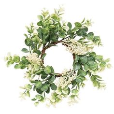 a wreath with white flowers and green leaves