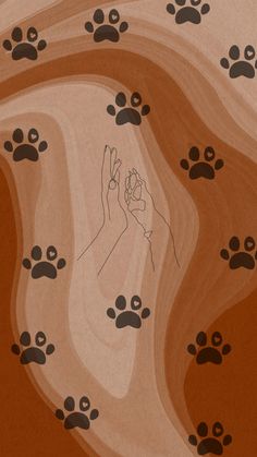 a drawing of a hand reaching up to paw prints