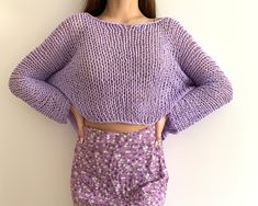 "Hand knit cotton sweater Color on the photo : LAVENDER  Size on the photo: M ✔️55 % cotton  ✔️45 % acrylic  READY TO SHIP Measurements are various for every size because sweater is loose but anyway the top looks oversized.  Dimensions for M size: Length - 45 cm. / 17.7\" Width - 54-58 cm. / 21.2\"-22.8\" Sleeve lenght - 68-70 cm. /26.7\"-27.5\" Sleeve girth- 30 cm. / 11.8\" Weight - 0.205 kg. /7.23 oz oz Model measurements: Height - 1.7 cm./ 5.7 ft. Bust - 87 cm./ 43'' Waist - 63 cm./ 24'' Hips - 90 cm./ 35.4\" This is a white cotton short small loose sweater  Full hand knit summer sweater is super light. This is a fishnet style makes your outfit looks so hot. This sweater is light and transparent  Simple natural arm knit women sweater arm knit from the slim cotton yarn. The sweater is so Trendy Chunky Knit Cotton Sweater, Trendy Cotton Chunky Knit Sweater, Oversized Chunky Knit Cotton Sweater, Long Sleeve Cropped Cotton Sweater With Chunky Knit, Cotton Cropped Sweater With Chunky Knit And Long Sleeves, Cotton Cropped Sweater With Chunky Knit, Cropped Cotton Sweater With Chunky Knit And Long Sleeves, Oversized Cotton Knit Sweater, Cozy Cotton Chunky Knit Sweater