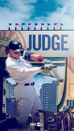 a baseball player swinging a bat in front of a large sign that says judge on it